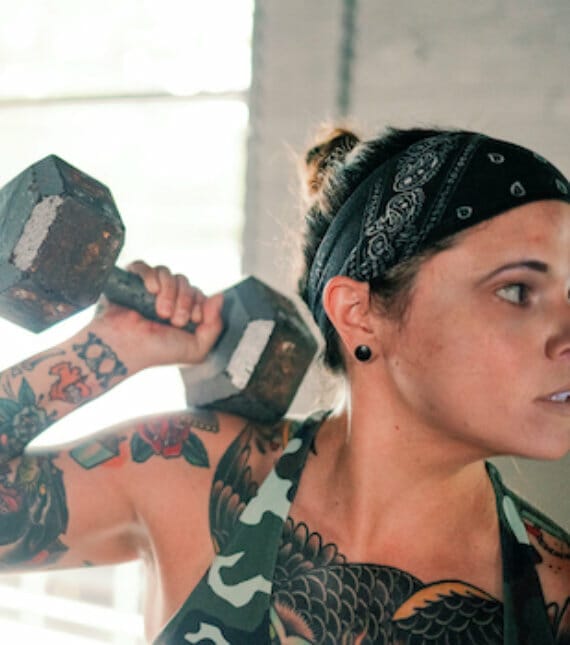Close-up woman on training at Help First Fitness